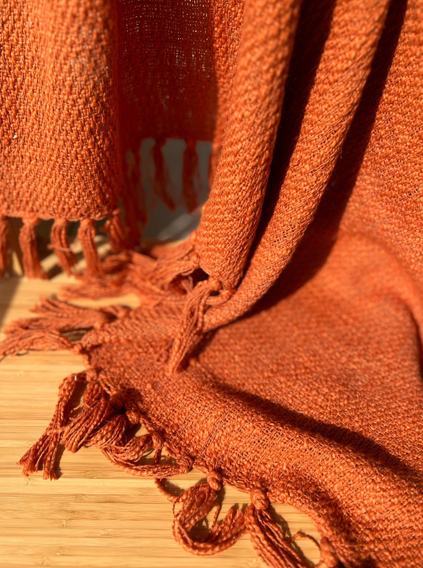 Orange Woven Throw with Knotted Tassels